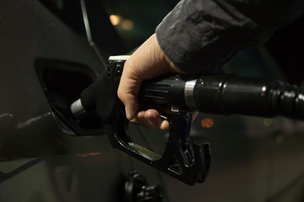 Holding a fuel trigger in the on position with your hand instead of using a stand is the safest practice.